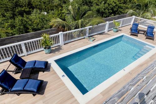Stay in a Long Bay Beach Villa with a Shared Pool